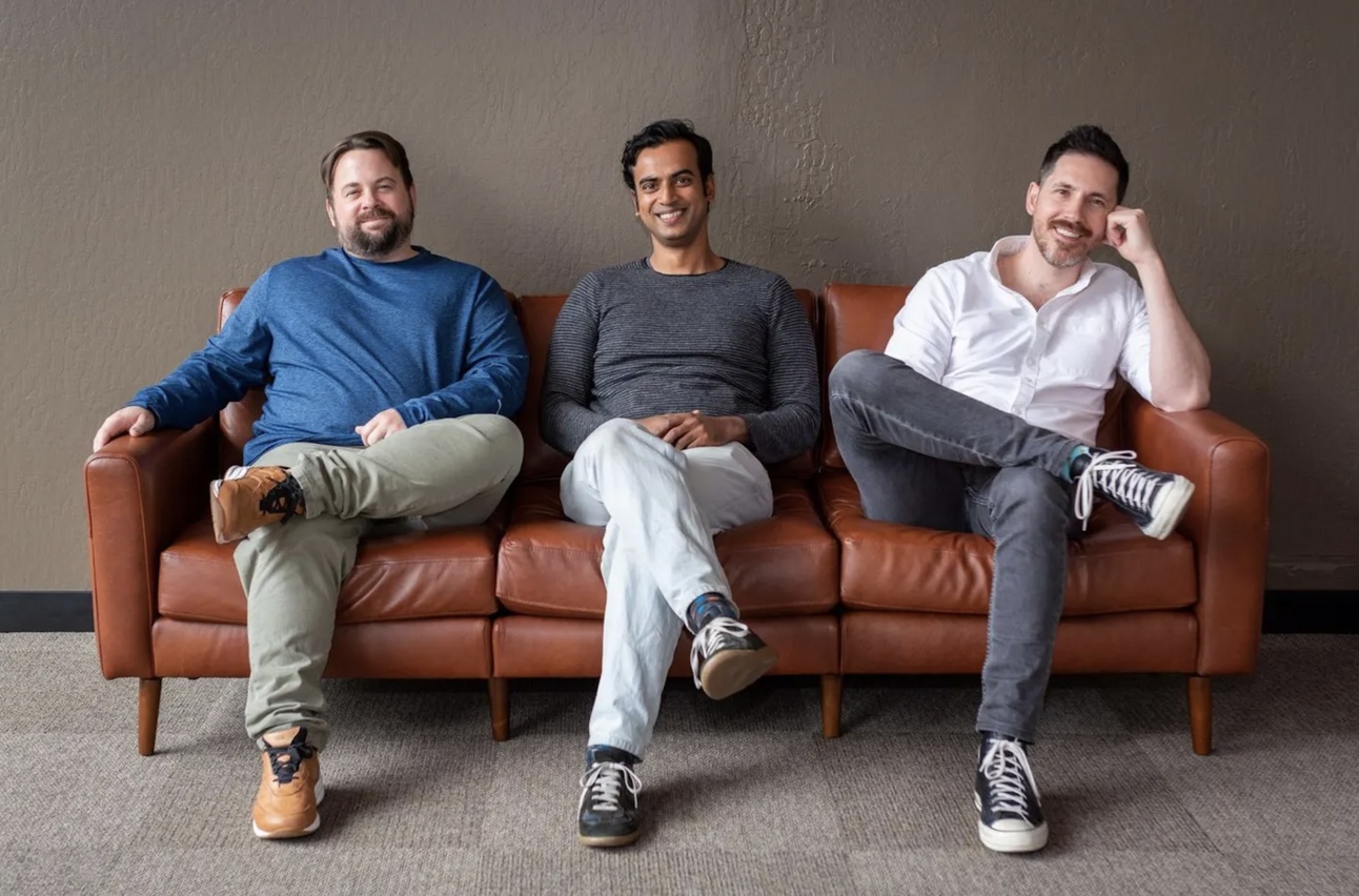 Convex co-founders Jamie Turner, Sujay Jayakar and James Cowling seated together on a brown leather sofa