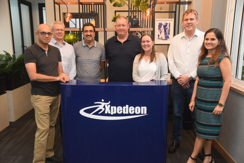 Janak Vakharia, at left, with members of the Xpedeon and JN Bentley teams in Mumbai