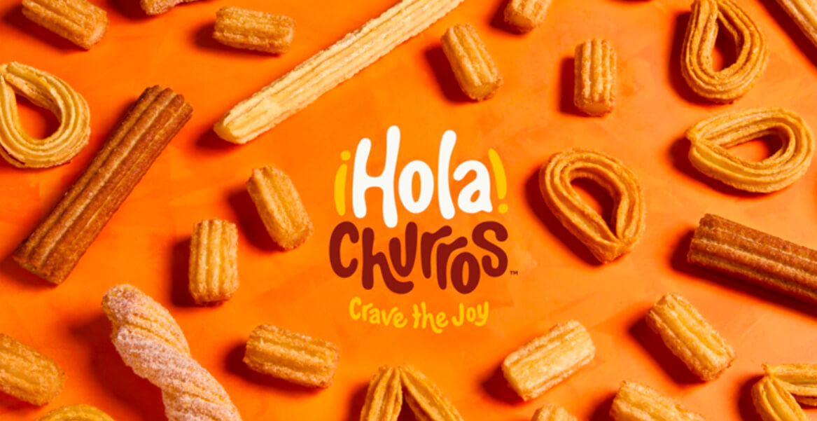 An overhead assortment of ¡Hola! Churros with toppings and dips