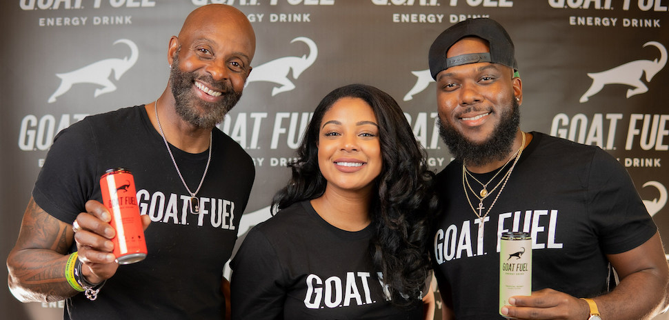Jerry Rice, Jaqui Rice Gold and Trevion Gold together in G.O.A.T. Fuel shirts