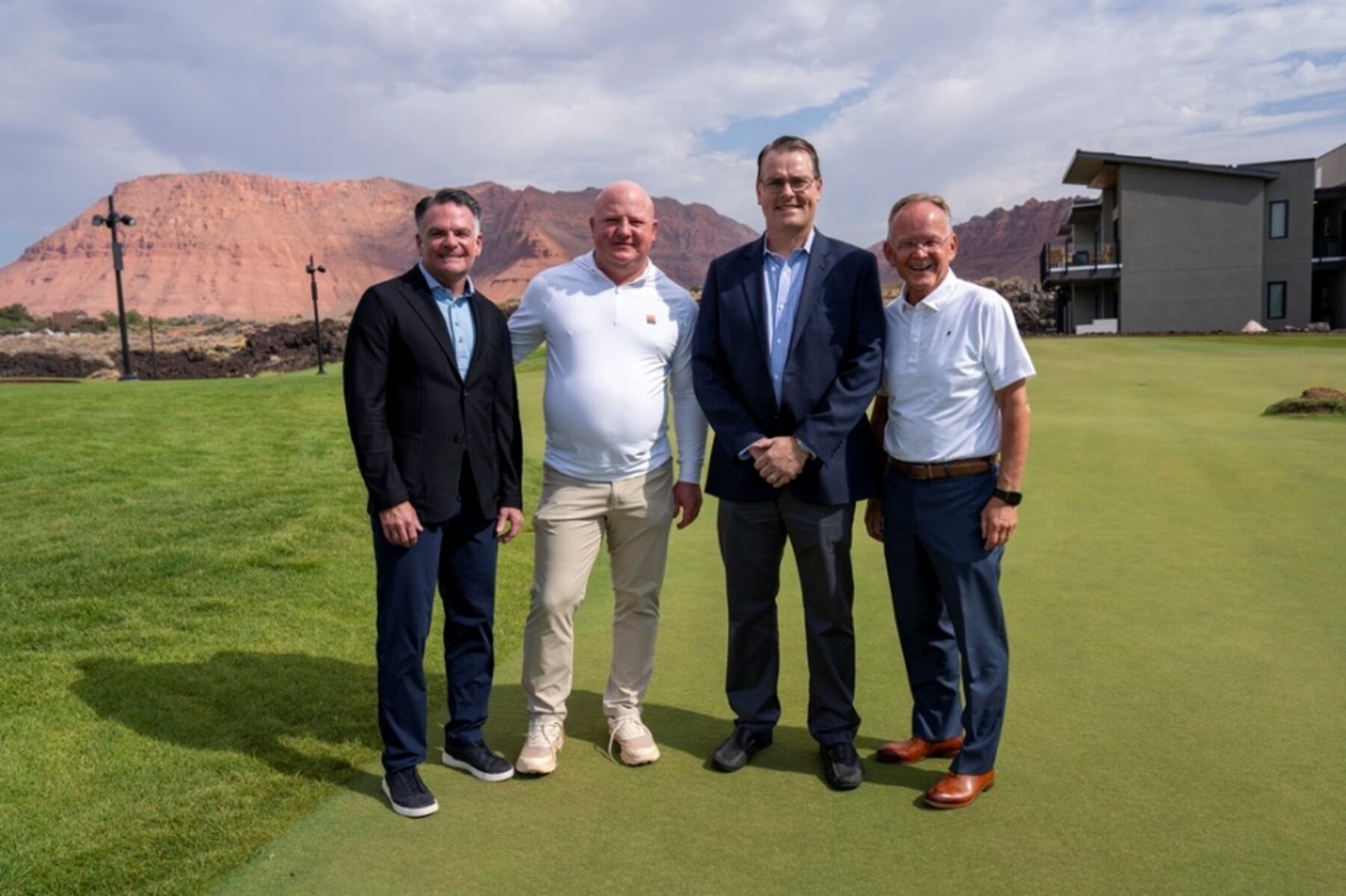 Branden Hansen, Jared Lucero, Kelly Jensen and Stuart Adams standing together at Black Desert Resort