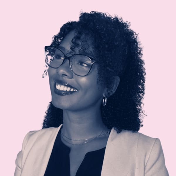 Jasmine Oliveira smiling in her LeadDev speaker portrait