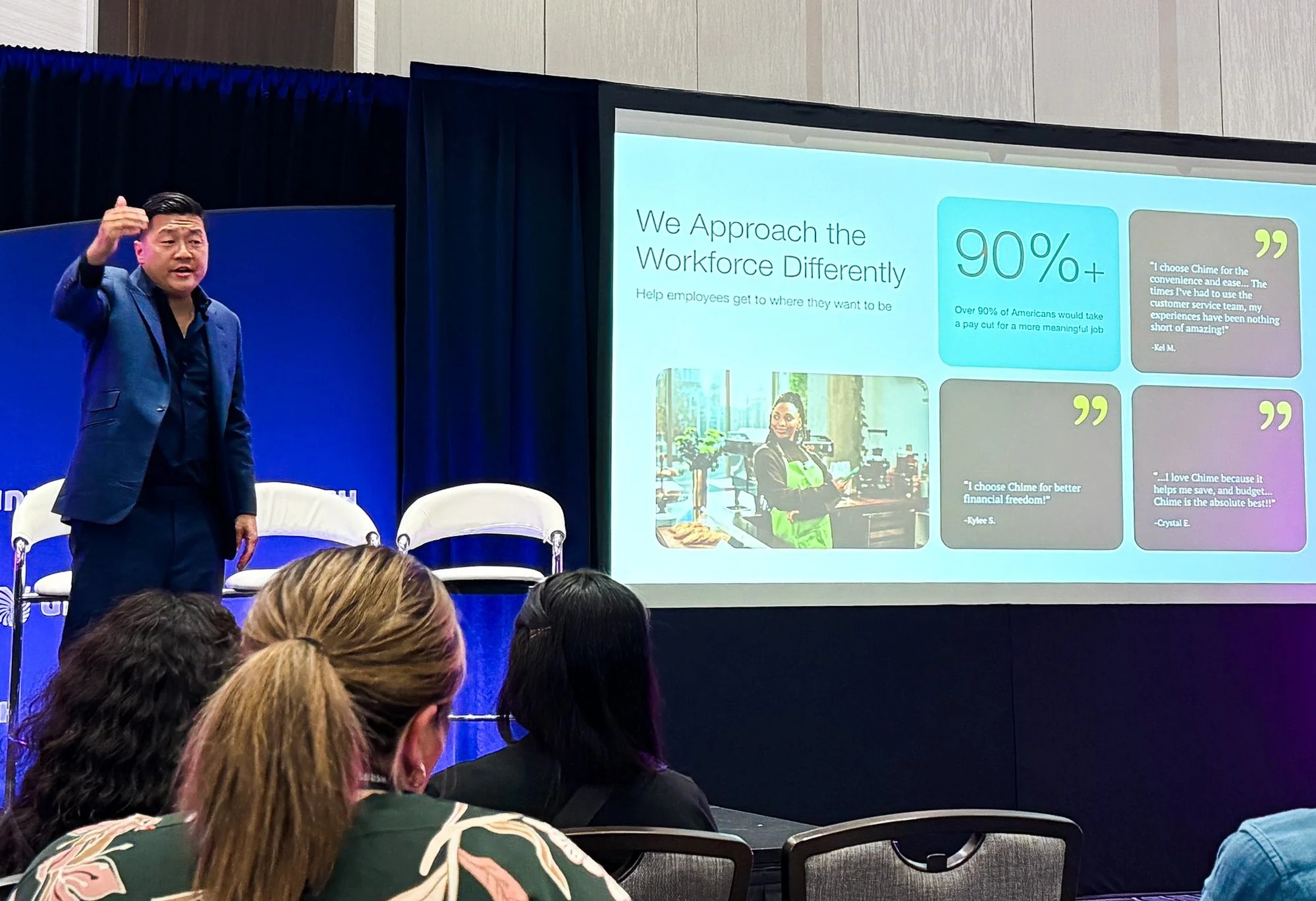 Jason Lee speaking beside a presentation about the workforce at an UNLEASH conference