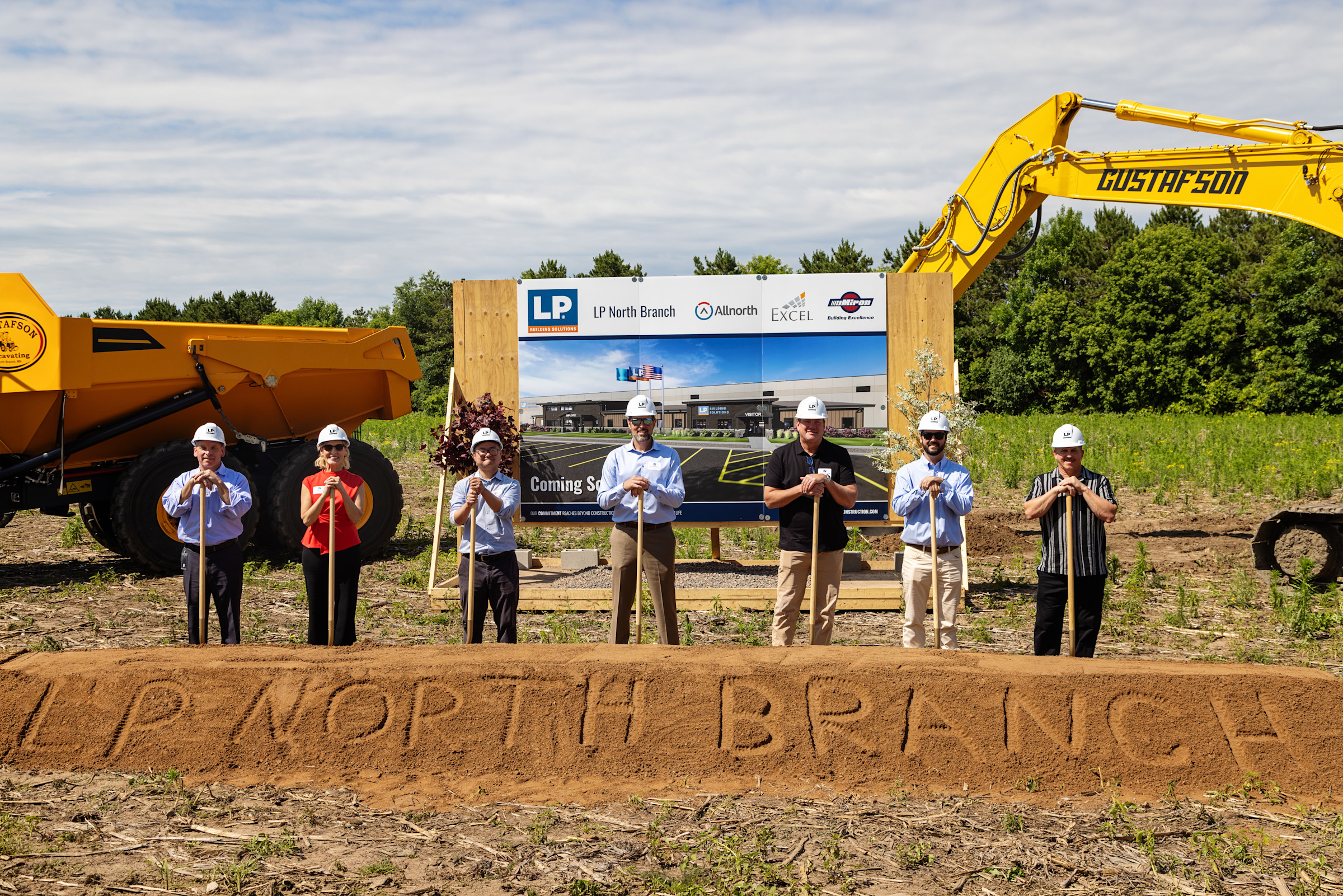 LP representatives and community leaders with ceremonial shovels at the North Branch facility groundbreaking