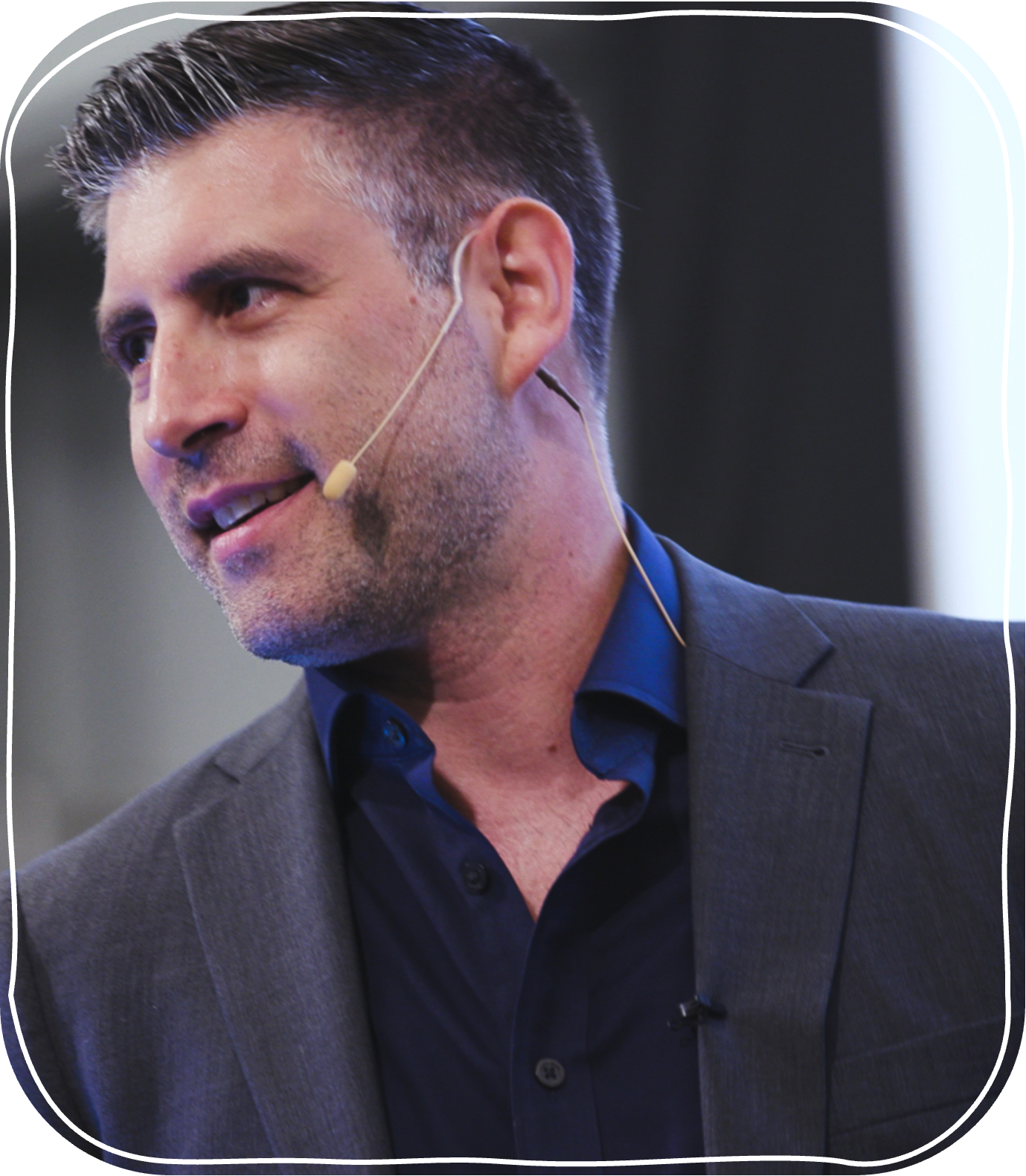 Jay Acunzo speaking on stage