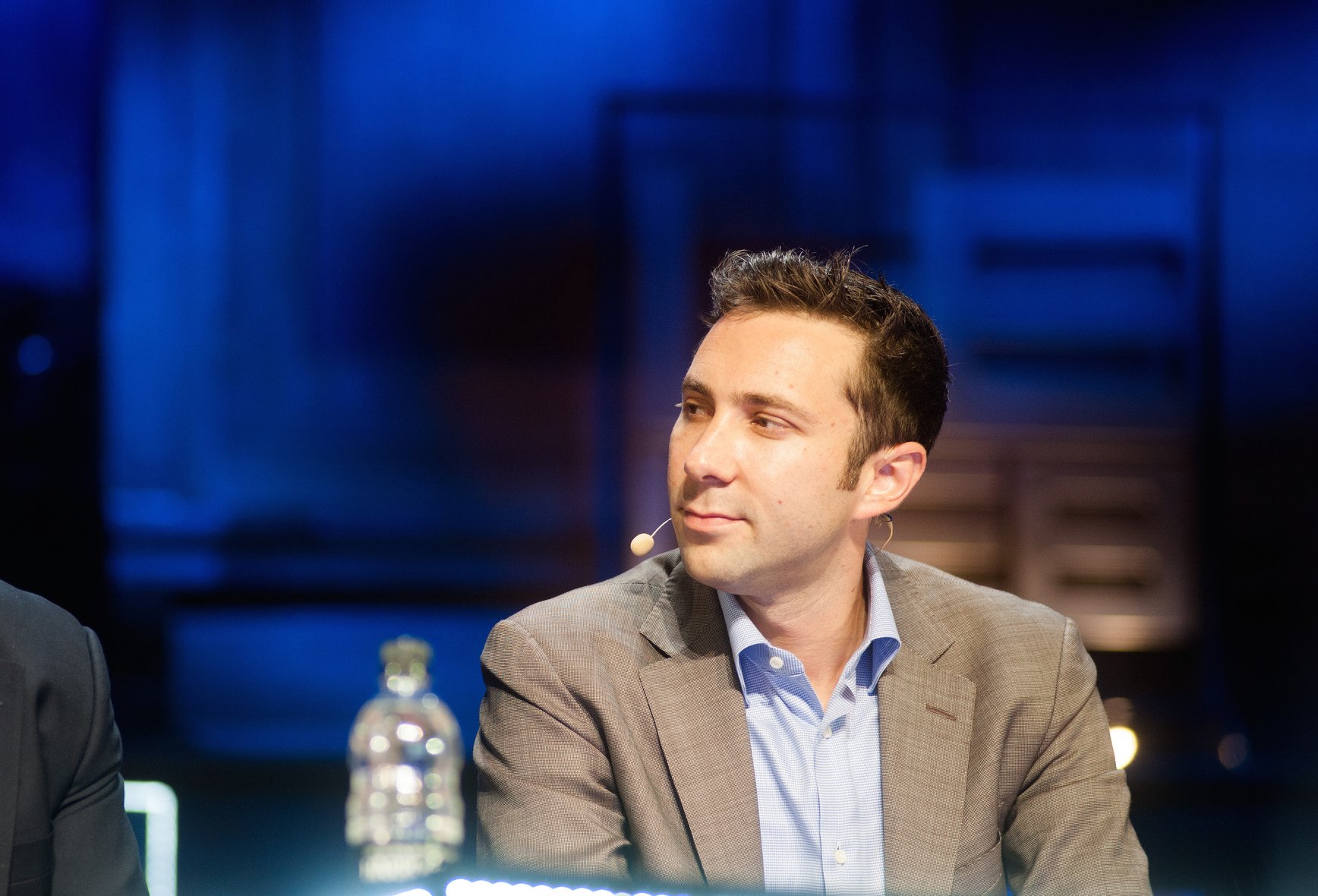 Jay Bregman wearing a headset microphone during a conference discussion at LeWeb12.