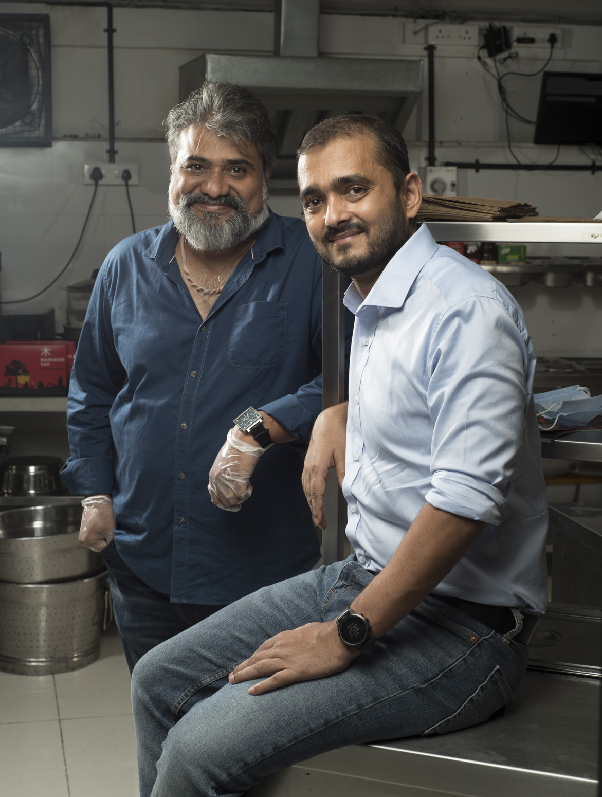 Kallol Banerjee, left, and Jaydeep Barman in a commercial kitchen