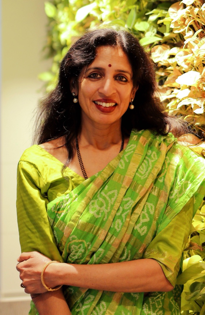 Jayshree Ullal wearing a green sari at Arista’s Bangalore office opening in December 2015