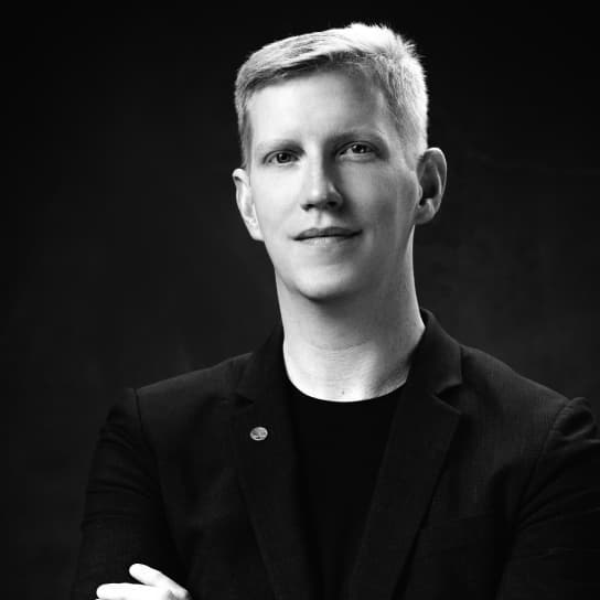 Black-and-white portrait of JDI founder and CEO Josh Jones-Dilworth
