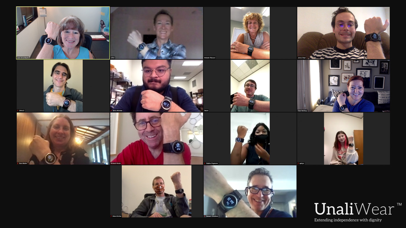 Jean Anne Booth at upper left and UnaliWear colleagues showing their watches during a team video call