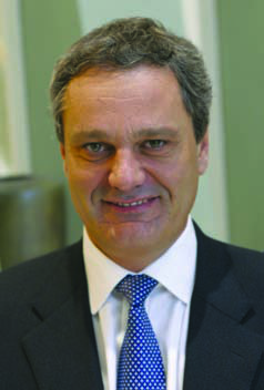 Jean-Hervé Jenn in a suit and blue tie in a published 2013 press portrait