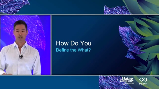 Jedidiah Yueh presenting beside a slide asking How Do You Define the What at the Data Company Summit 2022