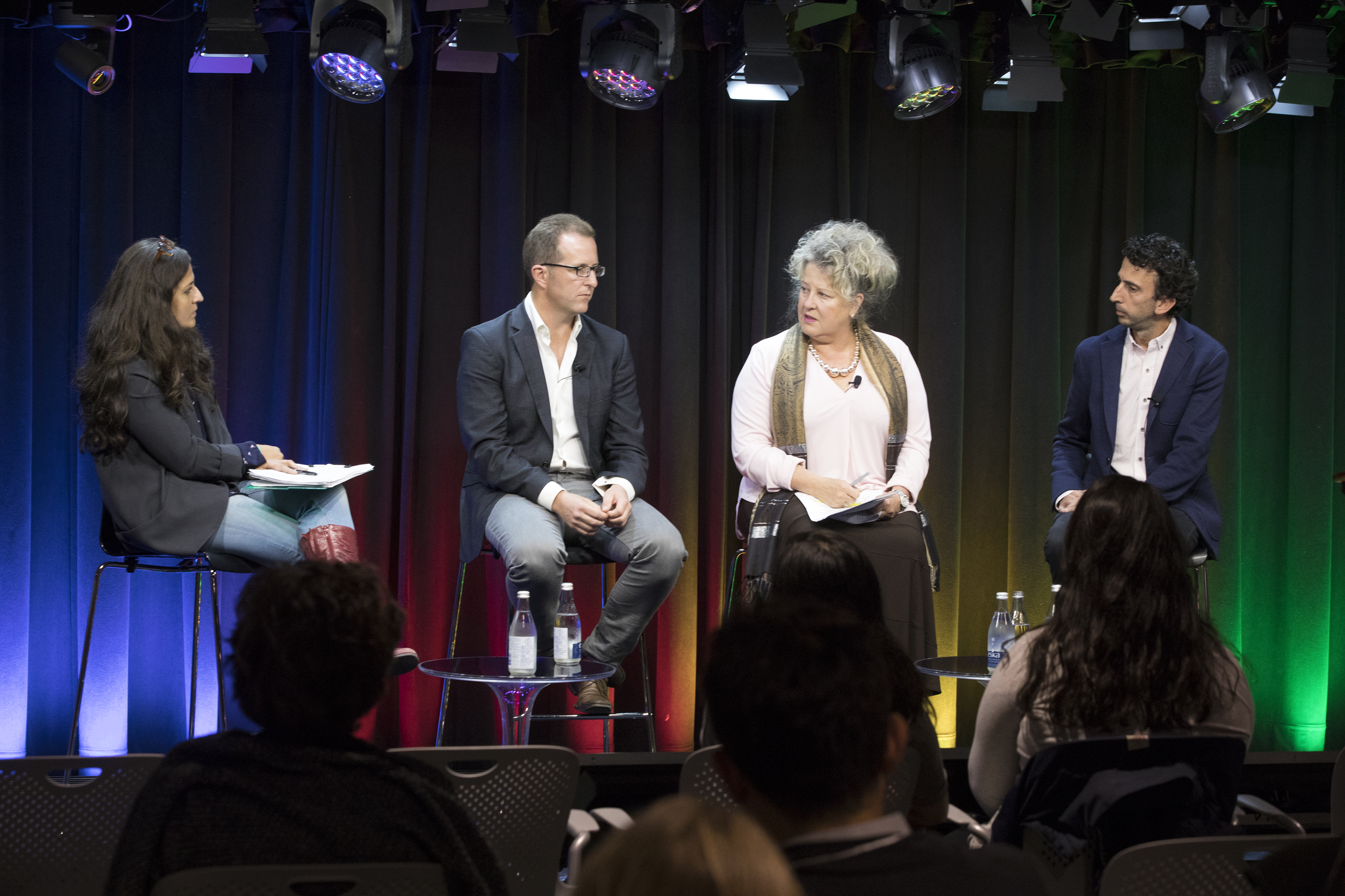 Jeff Elgie, second from left, taking part in a four-person journalism panel in Toronto