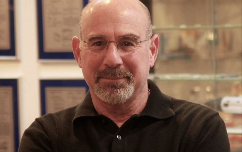 Jeff Elkins seated in an office in 2019
