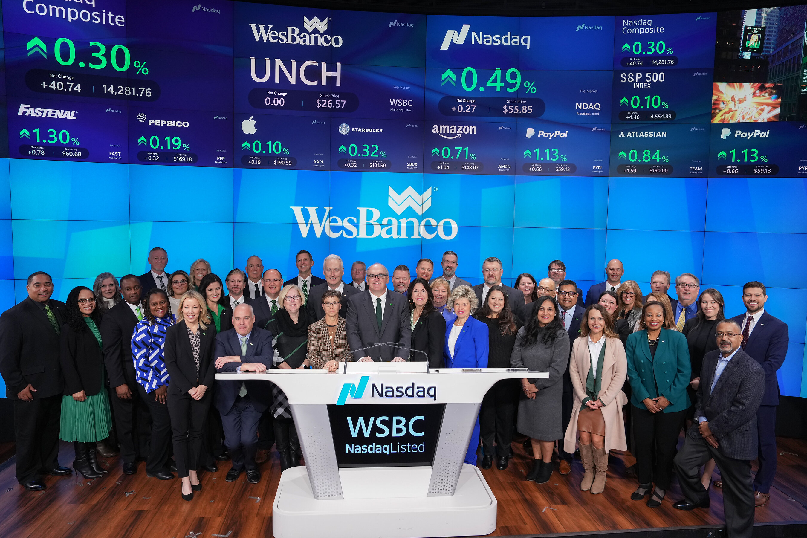 Jeff Jackson and WesBanco colleagues gathered behind the Nasdaq podium at the November 2023 opening bell ceremony