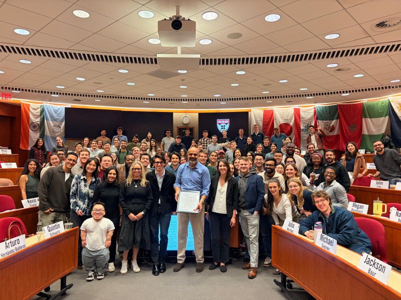 A Harvard Business School classroom filled with participants after a discussion of the Lovable case