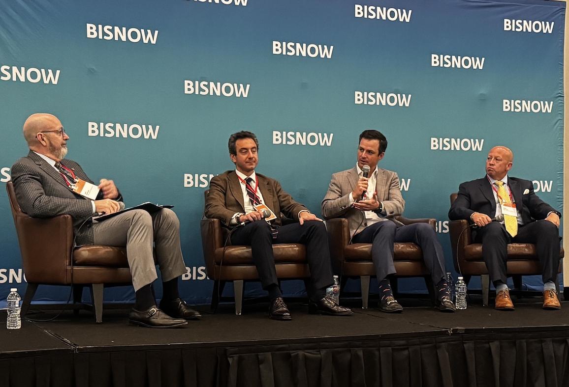 Jeff Samples at left moderates a Houston commercial real estate finance panel with Justin Levine, Michael Johnson and Toby Kettle.