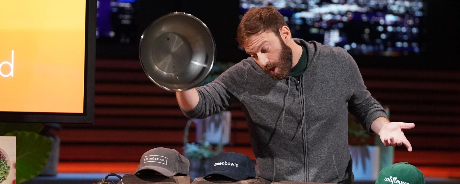 Jeffrey Appelbaum presenting Salted on the Shark Tank set beside the company's restaurant brands