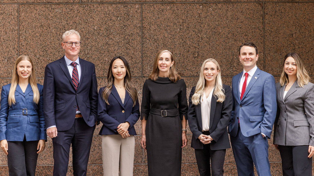 Members of the Kimbell and Associates health policy team standing together outdoors