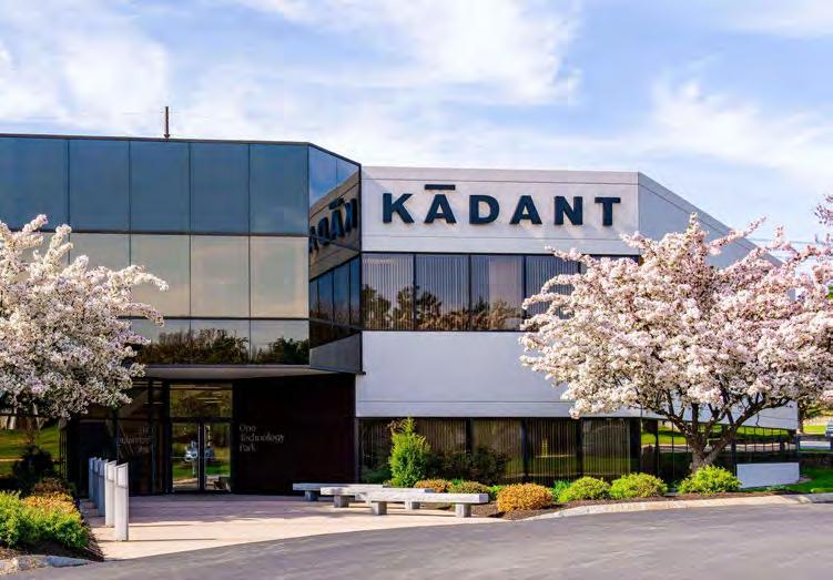 Kadant office building framed by flowering trees