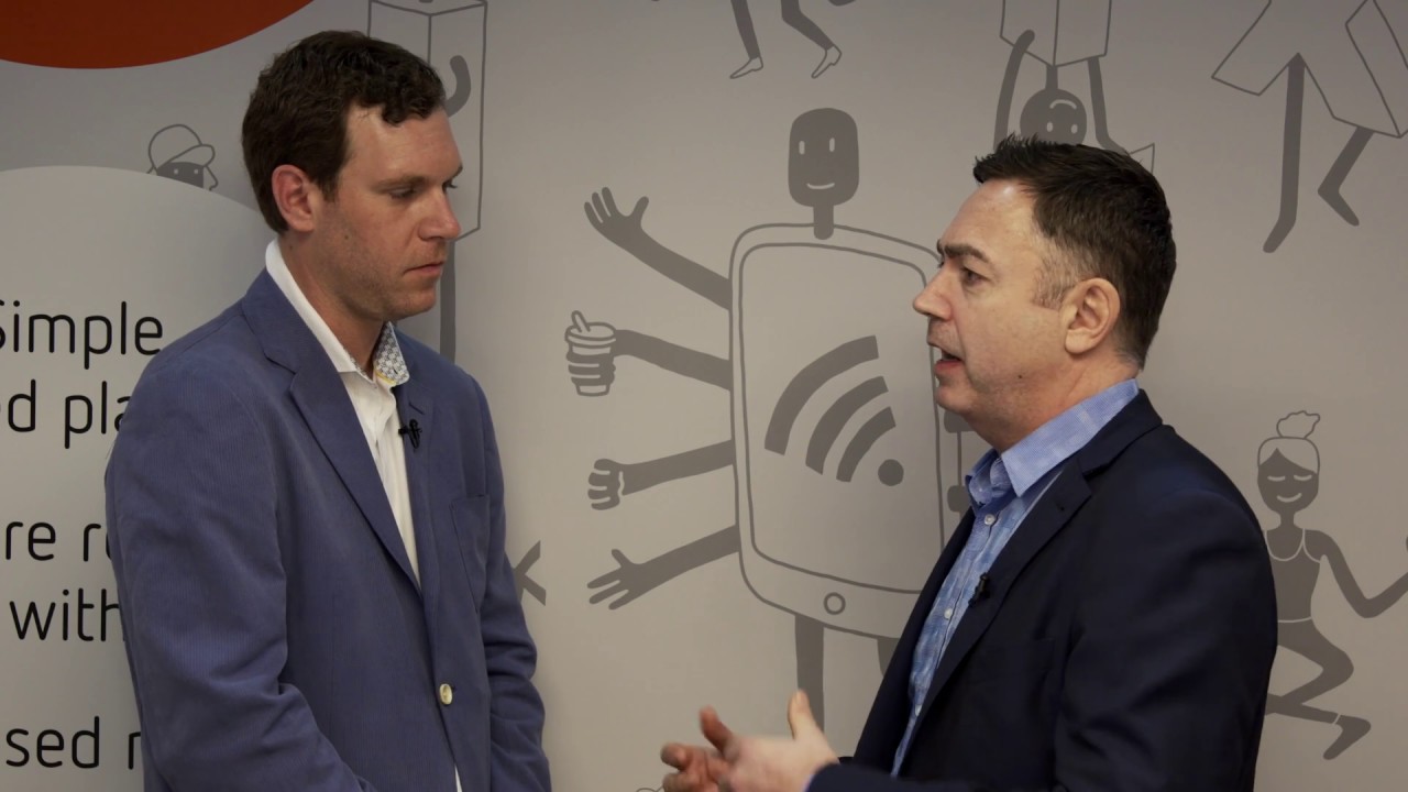 Jeffrey Sanderson speaking with an interviewer at Mobile World Congress in 2017