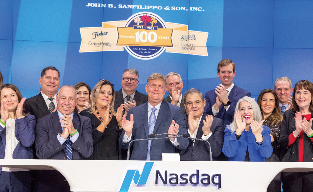 Jeffrey Sanfilippo surrounded by family and colleagues at the Nasdaq closing bell for the company’s centenary