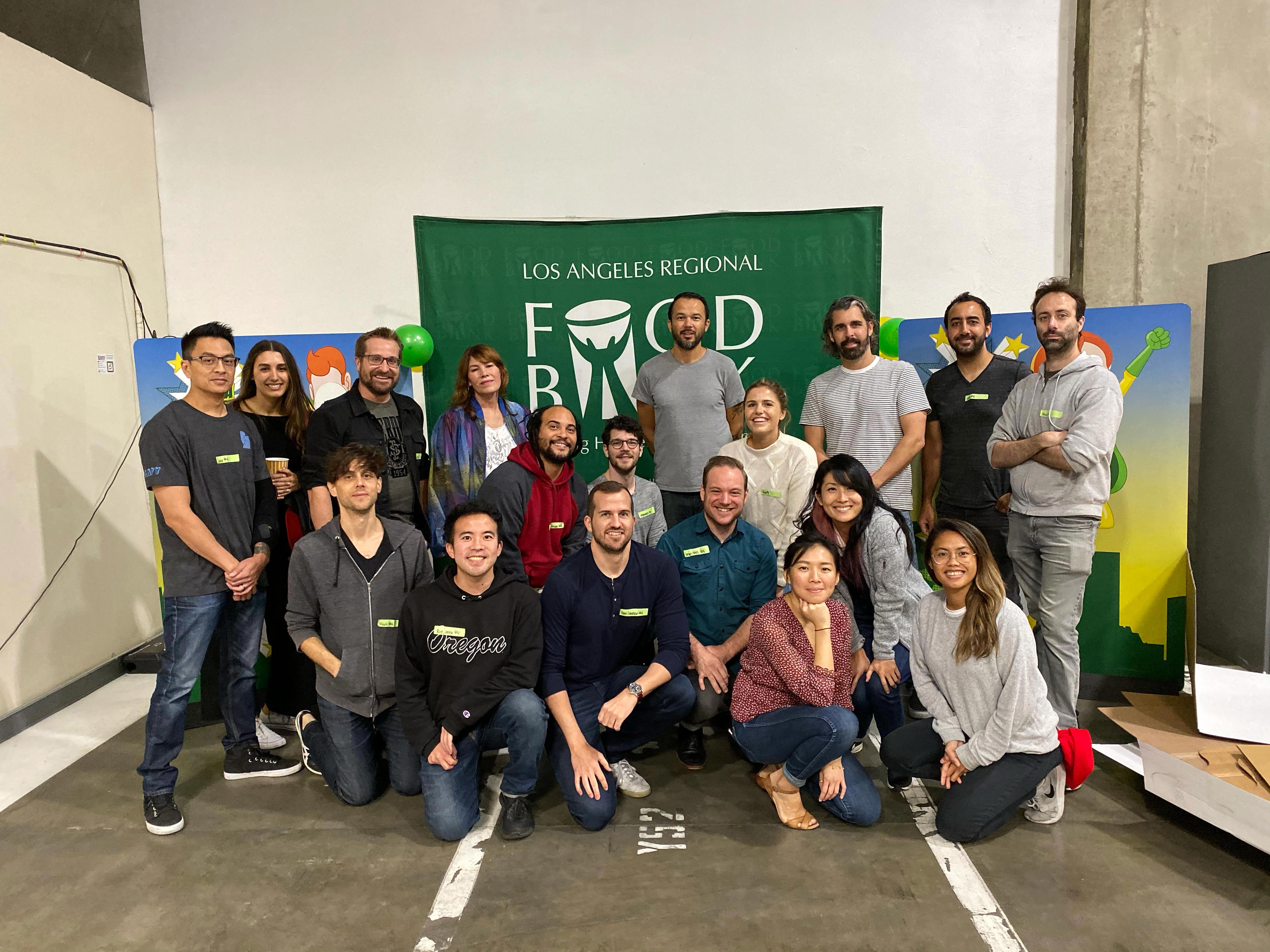 Jen Lucero and We Are Royale colleagues gathered at the Los Angeles Regional Food Bank