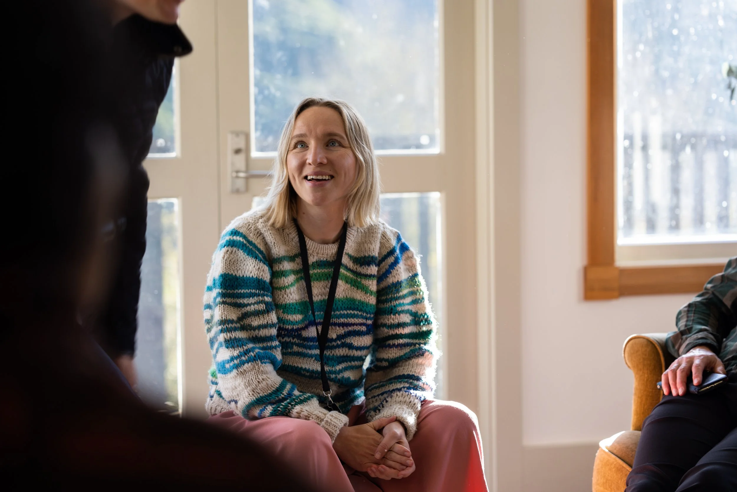 Jeni Mayorskaya seated in conversation at an Edmund Hillary Fellowship gathering