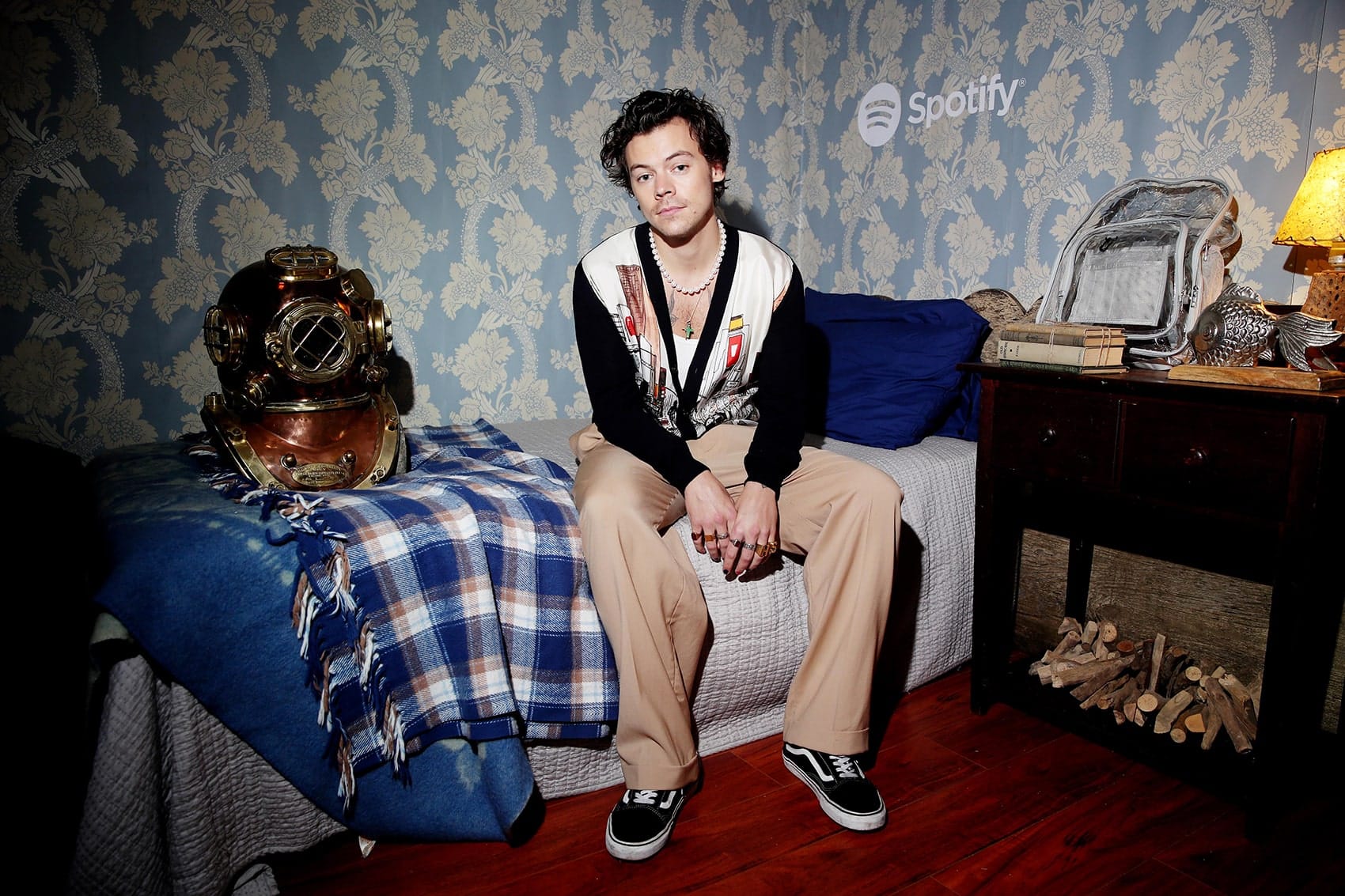 Harry Styles seated on a bed installation at a Spotify event, from Hustle&Co.’s campaign portfolio