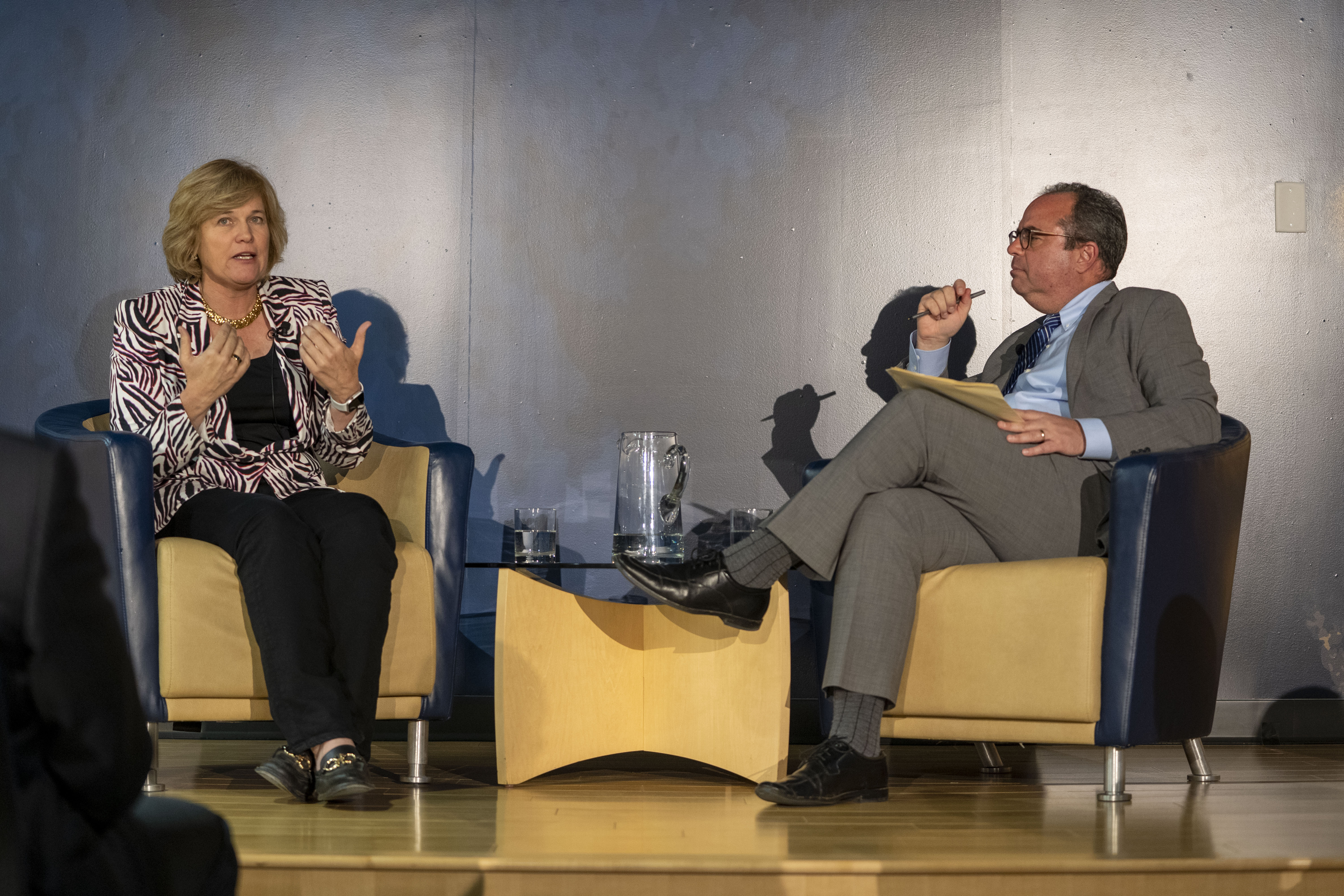 Jenny Johnson speaking with Financial Times editor Peter Spiegel at UC Davis in November 2022
