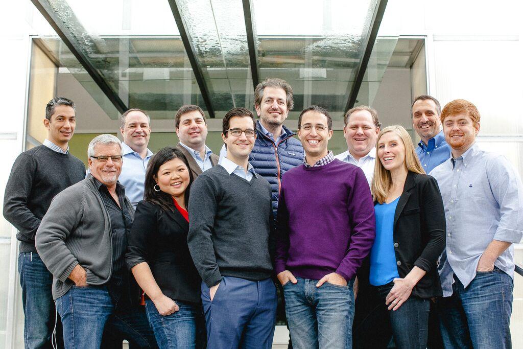 Jeremy Anspach with members of the PureCars team in a group photograph