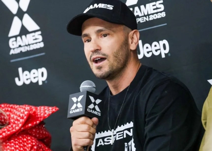 Jeremy Bloom holding a microphone at an X Games Aspen 2026 press event