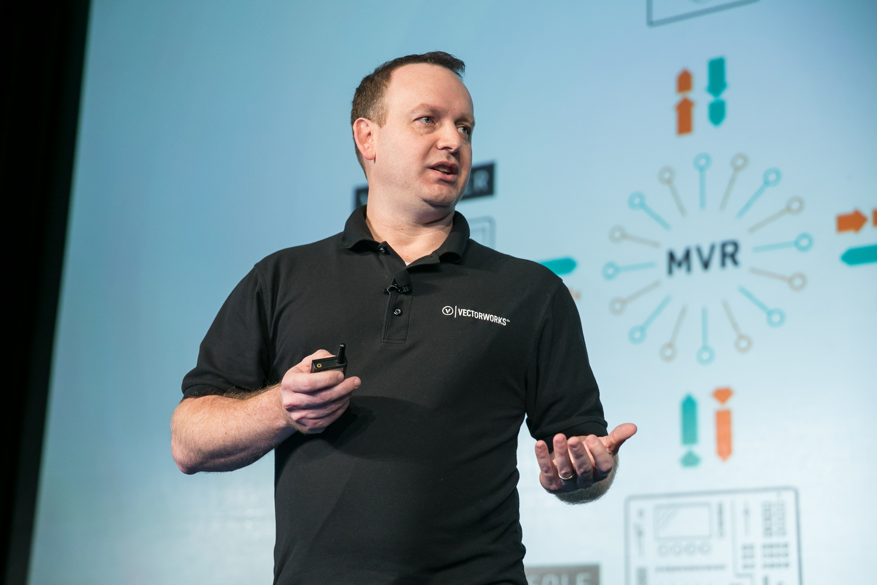 Jeremy Powell presenting MVR onstage at the 2018 Vectorworks Design Summit