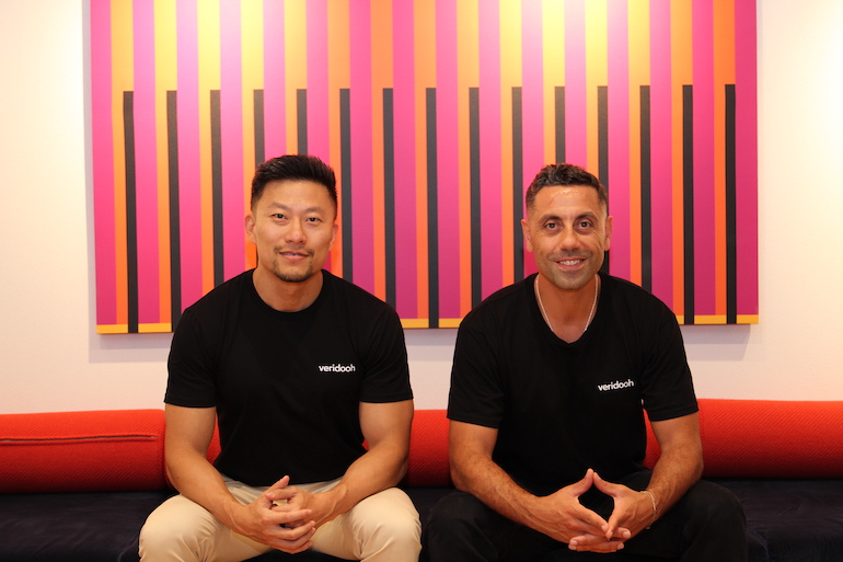 Jeremy Yang, left, and Mo Moubayed seated together in Veridooh shirts