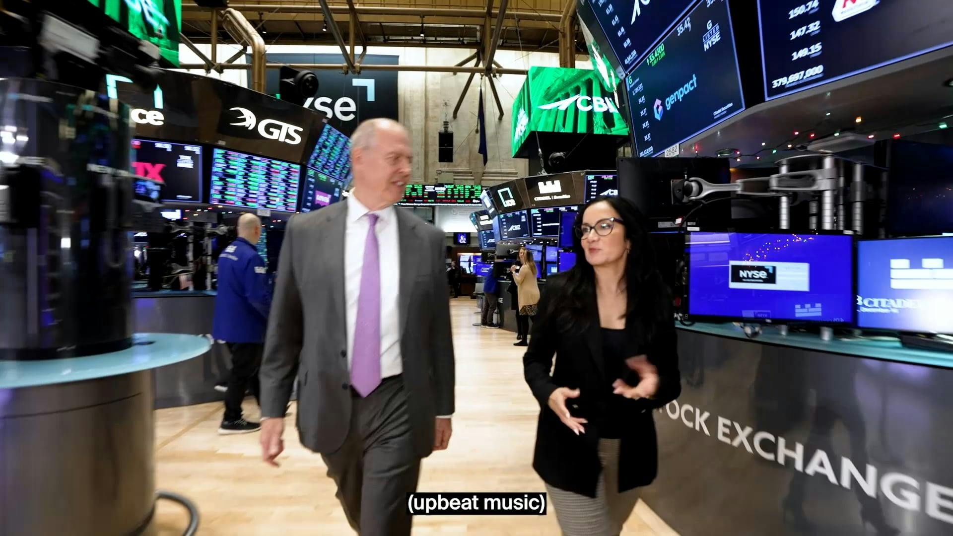 Jerry Grisko with interviewer Judy Khan Shaw on the New York Stock Exchange trading floor