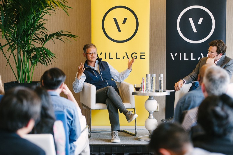 Jerry Yang speaking with Ben Casnocha before an audience at a Village Global event