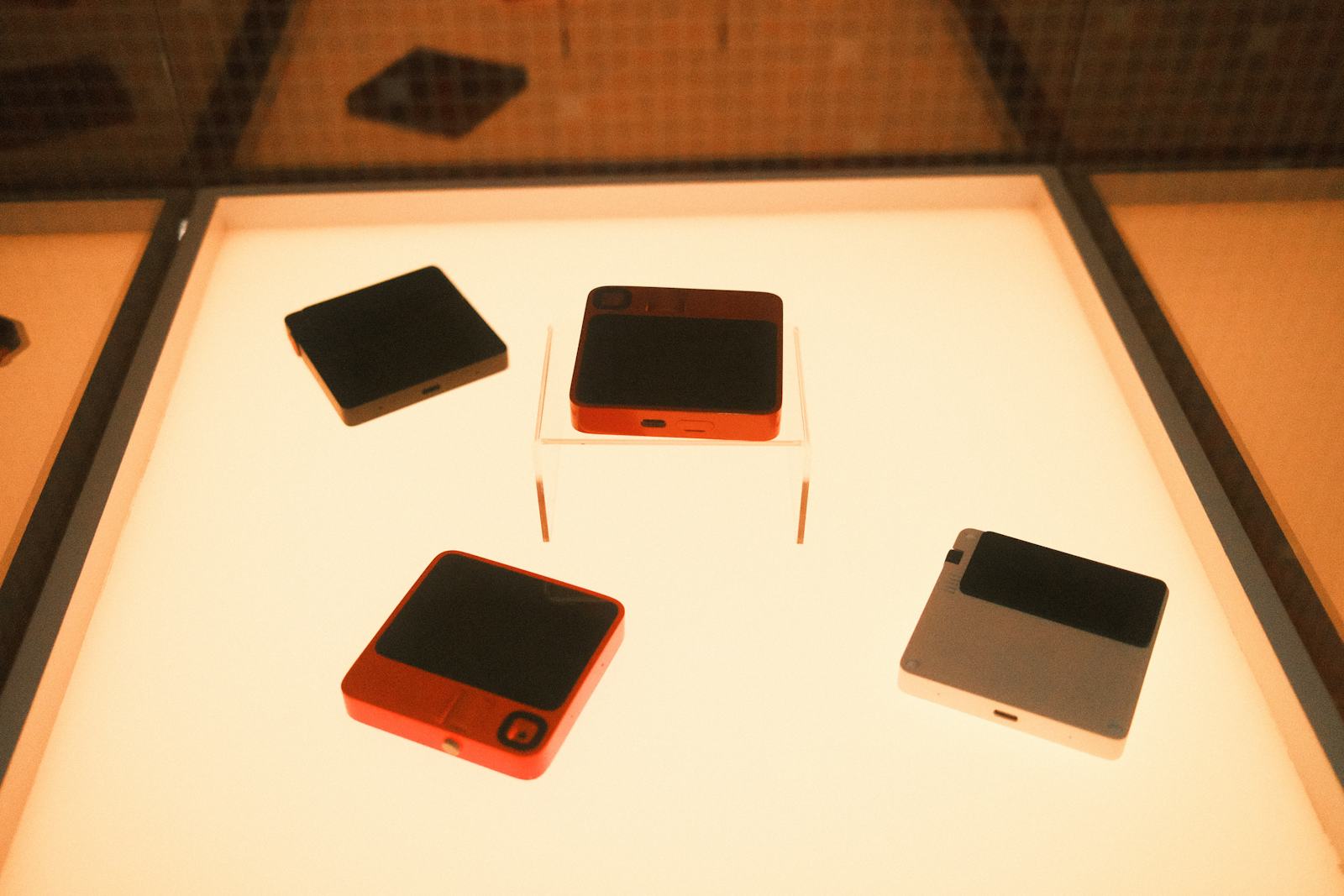 Rabbit r1 prototypes showing the development of the handheld device
