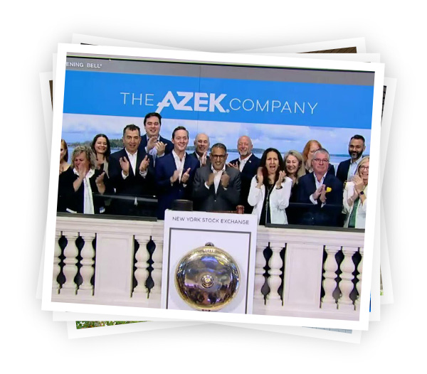 Jesse Singh and the AZEK team applaud at the New York Stock Exchange balcony
