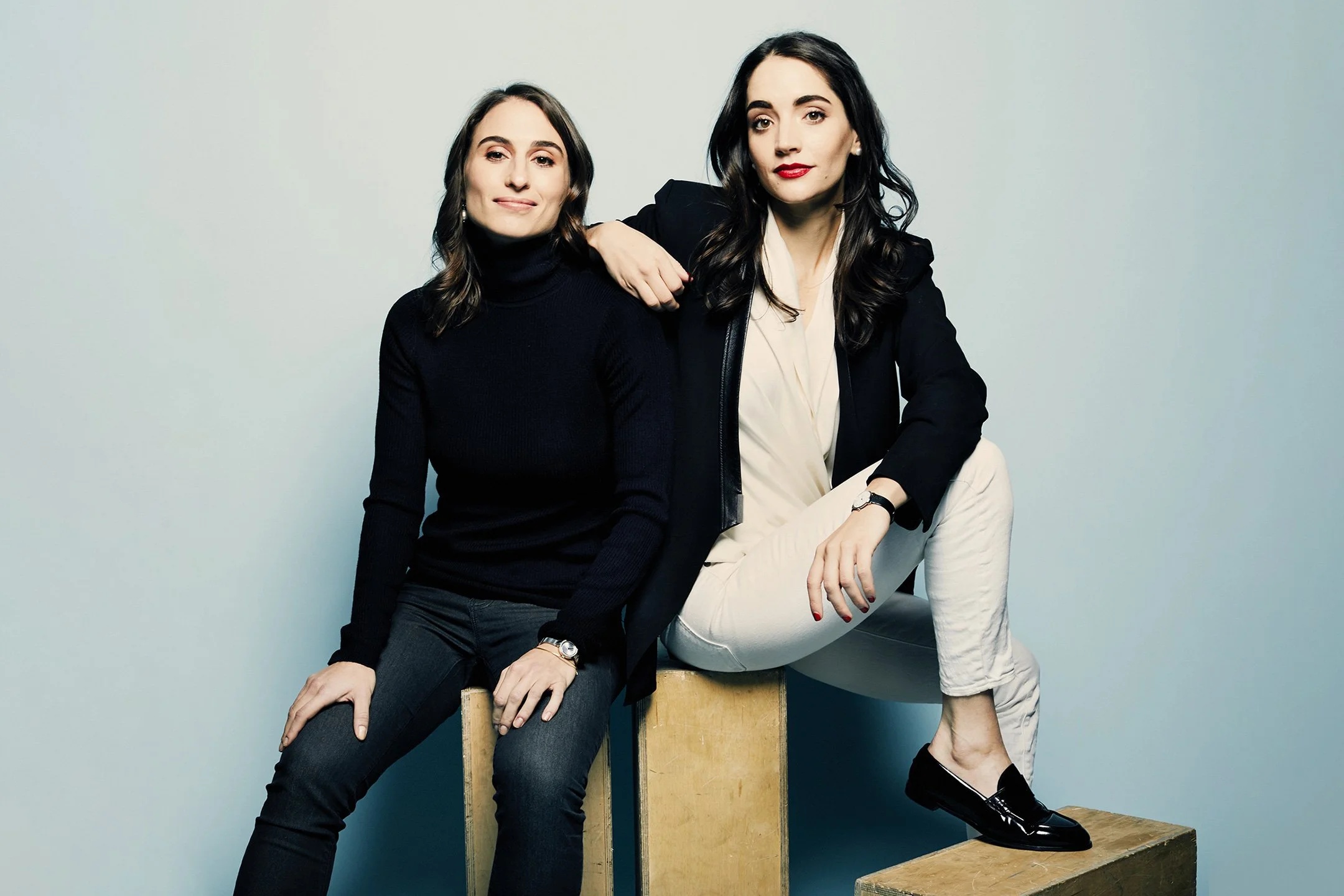 Alfred co-founders Jessica Beck, left, and Marcela Sapone seated together