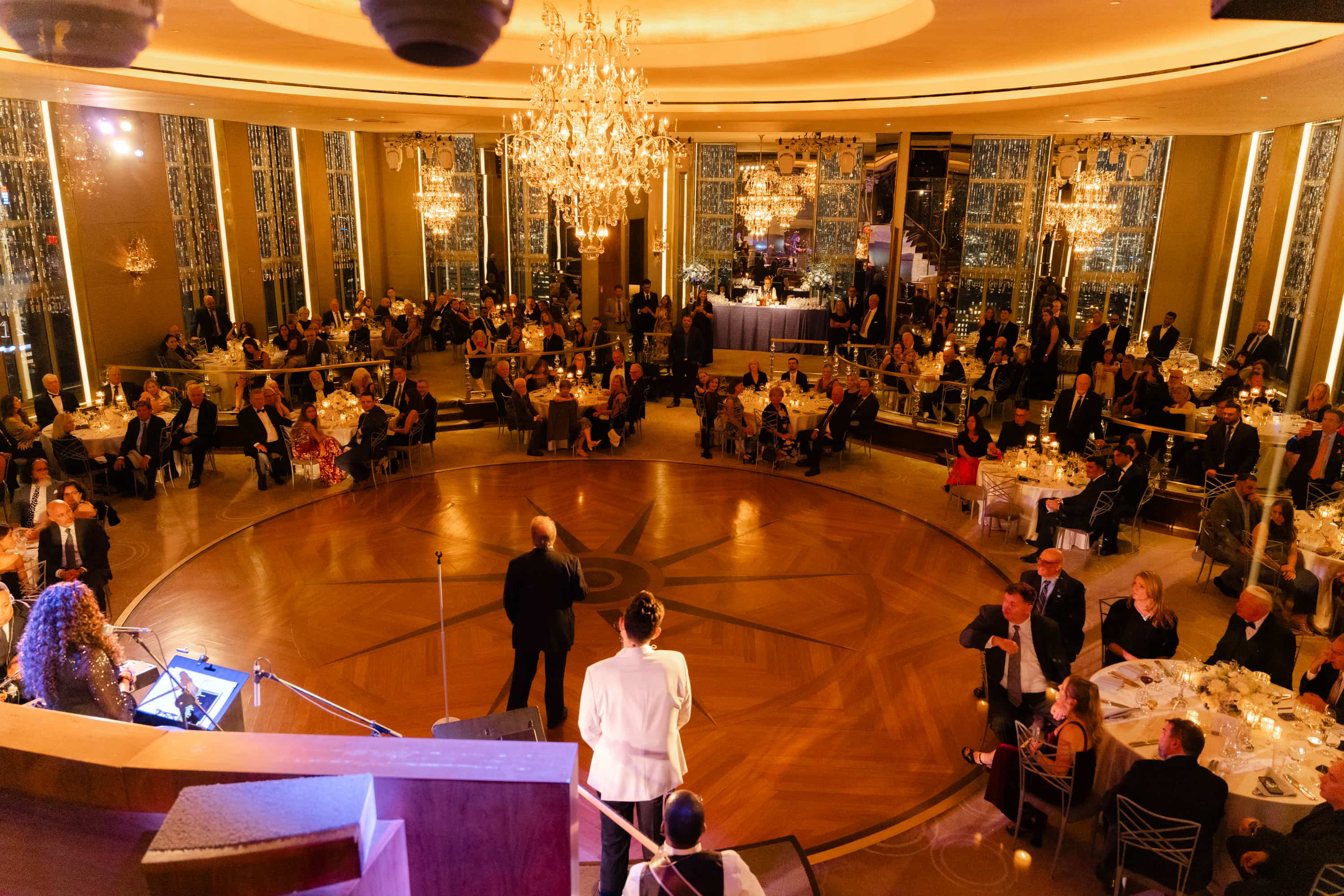 Guests gathered around the dance floor at Align’s Rainbow Room anniversary celebration