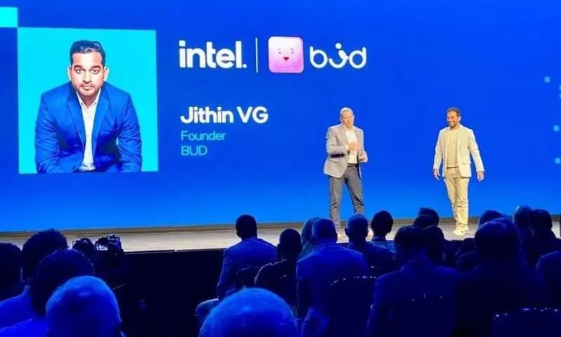 Jithin VG and Christoph Schell on the Intel Vision stage, with Intel and Bud branding behind them