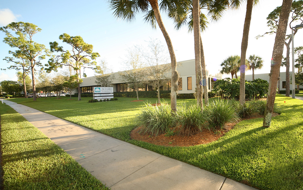 JM Family building surrounded by trees and landscaped grounds