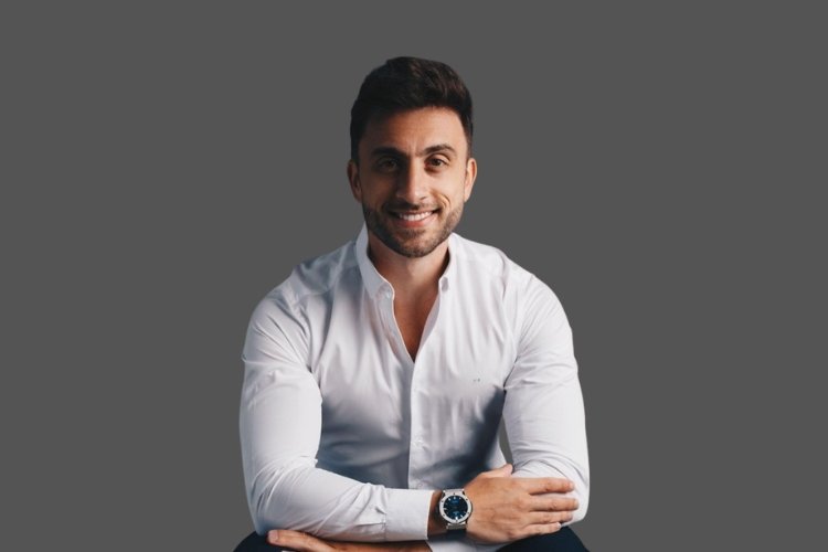 João Brognoli seated in a white shirt, in the press photograph accompanying his Ambience Private Equity announcement