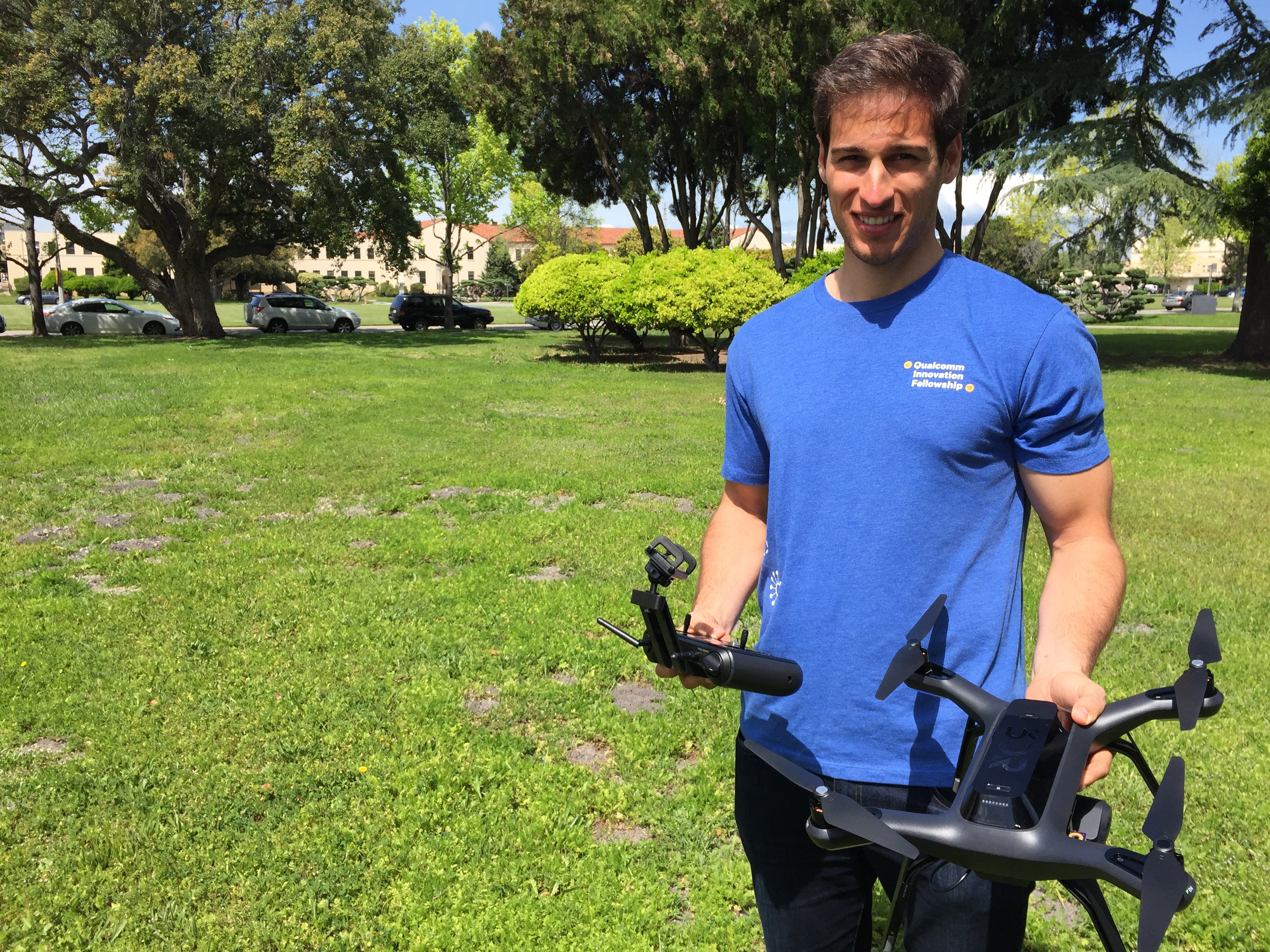João Diogo Falcão holding a research drone outdoors at Carnegie Mellon Silicon Valley