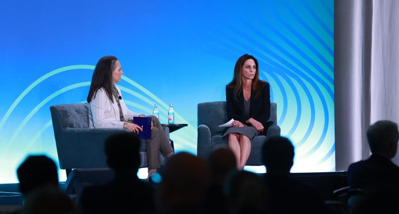 Jodi Cason, seated on the right, in conversation with Michelle Sartain at Marsh’s conference in Dallas