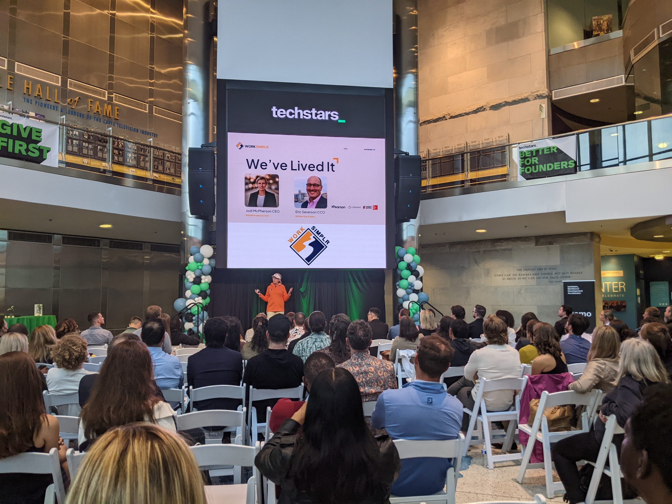 Jodi McPherson pitching Work Simplr onstage at Techstars Workforce Development Demo Day in Denver