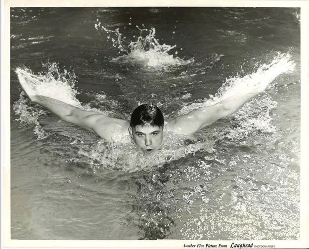 Archival photograph of Jody Grant swimming butterfly