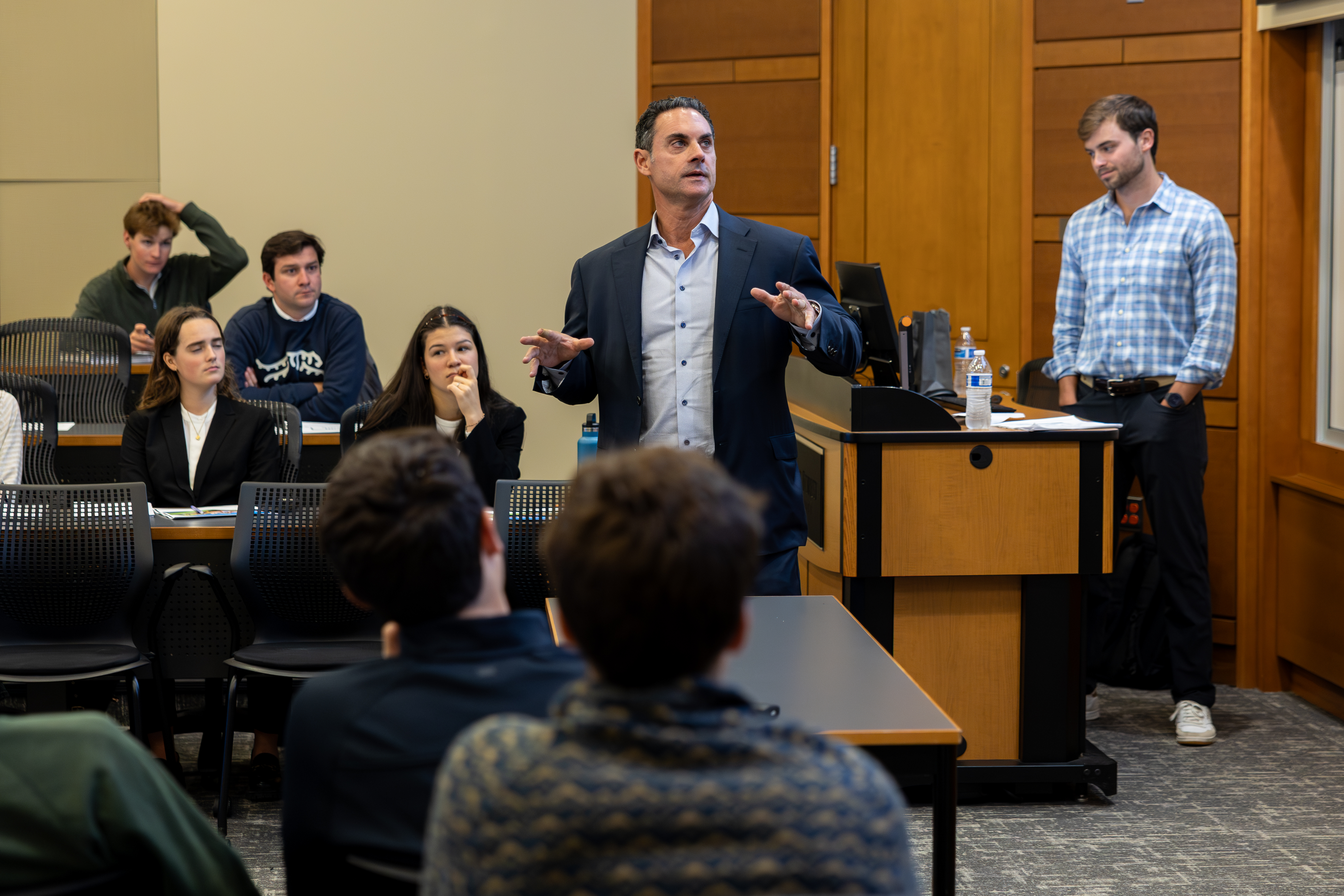 Joe Alala speaking with students in a classroom at Wake Forest's Farrell Hall