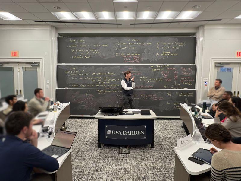 Darden students seated around a classroom as a visiting instructor discusses NVIDIA at a chalkboard