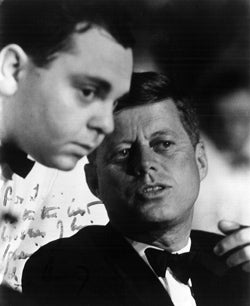 Young Joseph R. Cerrell leans toward John F. Kennedy in conversation